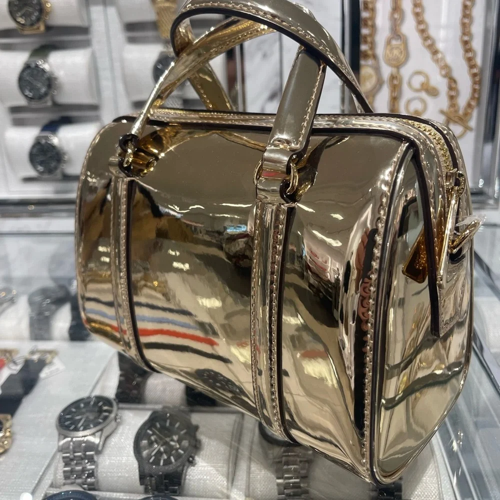 MICHAEL KORS Jet Set Small Metallic Convertible Crossbody Duffle Xbody
Pale Gold - Picture 11 of 16